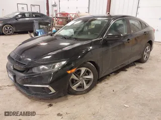 2019 Honda Civic Sedan LX with VIN 2HGFC2F69KH555697, listed as a IAAI auction lot 41664312 with 112,993 mi miles. Bid and sale history available at carsss.com. Image 17.