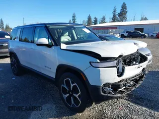 2024 Rivian R1S Adventure with VIN 7PDSGBBA9RN039684, listed as a IAAI auction lot 41558846 with 13,725 mi miles. Bid and sale history available at carsss.com. Image 14.