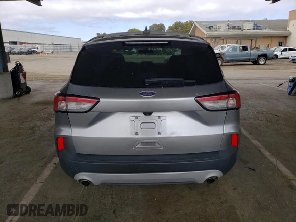 2022 Ford Escape SE with VIN 1FMCU0G63NUA69580, listed as a Copart auction lot 60127375 with 61,556 mi miles and Salvage title. Bid and sale history available at DreamBid. Image 6.