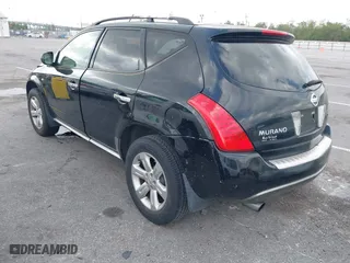 2006 Nissan Murano SL with VIN JN8AZ08T06W411157, listed as a IAAI auction lot 41957424 with 121,902 mi miles. Bid and sale history available at carsss.com. Image 3.