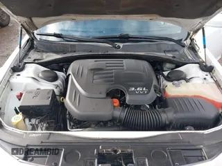 2013 Chrysler 300 with VIN 2C3CCABG2DH547247, listed as a IAAI auction lot 41755558 with 207,598 mi miles. Bid and sale history available at carsss.com. Image 10.