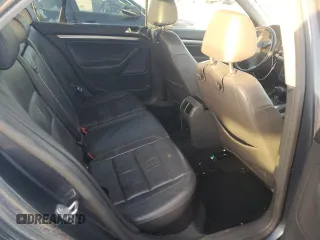 2007 Volkswagen Jetta z VIN 3VWDG71K27M010409, wystawiony jako Copart lot #84155424 z przebiegiem 140 665 mil mil oraz Czysty tytuł • Clean title. Historia ofert i sprzedaży dostępna na DreamBid. Obrazek 10.