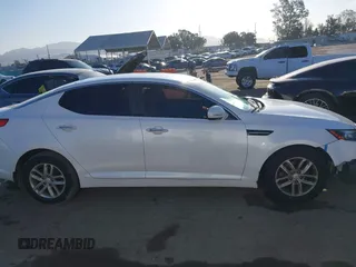 2013 Kia Optima LX with VIN KNAGM4A72D5362553, listed as a IAAI auction lot 42004593 with 127,918 mi miles. Bid and sale history available at carsss.com. Image 13.