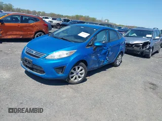 2012 Ford Fiesta SE with VIN 3FADP4BJXCM125881, listed as a IAAI auction lot 42044455 with 156,804 mi miles. Bid and sale history available at carsss.com. Image 2.