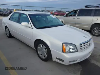 2004 Cadillac DeVille DTS z VIN 1G6KF579X4U238691, wystawiony jako IAAI lot #41367367 z przebiegiem 69 902 mil mil oraz . Historia ofert i sprzedaży dostępna na DreamBid. Obrazek 1.