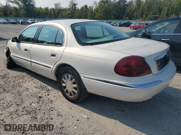 2001 Lincoln Continental with VIN 1LNHM97V91Y659769, listed as a Copart auction lot 71220804 with 0 mi miles and Salvage Title. Bid and sale history available at carsss.com. Image 2.