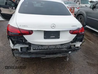 2021 Mercedes-Benz E-Class E 350 with VIN W1KZF8DB8MA897753, listed as a IAAI auction lot 41335129 with 76,873 mi miles. Bid and sale history available at carsss.com. Image 6.