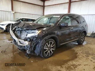 2021 Honda Pilot Touring 8-Passenger z VIN 5FNYF6H97MB064468, wystawiony jako Copart lot #53073915 z przebiegiem 58 667 mil mil oraz Szkoda całkowita • Salvage title. Historia ofert i sprzedaży dostępna na DreamBid. Obrazek 1.