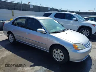2002 Honda Civic EX with VIN 1HGES25712L070997, listed as a IAAI auction lot 41963970 with 175,971 mi miles and . Bid and sale history available at DreamBid. Image 1.