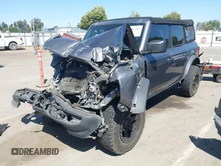 2021 Ford Bronco z VIN 1FMDE5BH9MLB00617, wystawiony jako IAAI lot #42467207 z przebiegiem 36 220 mil mil oraz . Historia ofert i sprzedaży dostępna na DreamBid. Obrazek 2.