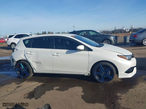 2018 Toyota Corolla iM with VIN JTNKARJE5JJ570832, listed as a IAAI auction lot 41819108 with 73,859 mi miles. Bid and sale history available at carsss.com. Image 14.