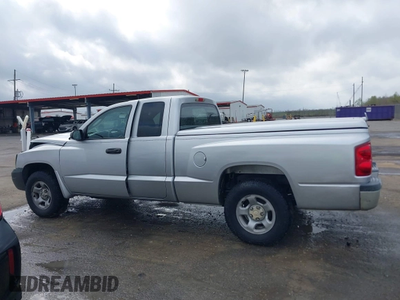2005 Dodge Dakota ST with VIN 1D7HE22K25S119460, listed as a IAAI auction lot 41790592 with 104,995 mi miles and . Bid and sale history available at DreamBid. Image 14.