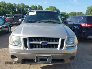 2003 Ford Explorer Sport Trac XLS z VIN 1FMZU67EX3UB19974, wystawiony jako IAAI lot #42563671 z przebiegiem 133 452 mil mil oraz . Historia ofert i sprzedaży dostępna na DreamBid. Obrazek 6.