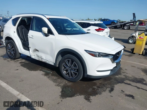2017 Mazda CX-5 Grand Touring with VIN JM3KFADLXH0222341, listed as a IAAI auction lot 41990464 with 94,374 mi miles and . Bid and sale history available at carsss.com. Image 1.
