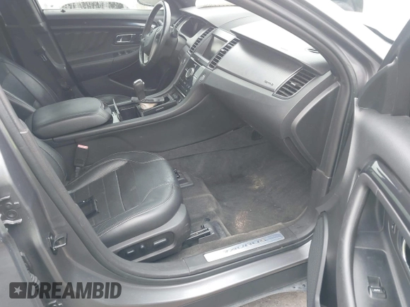 2014 Ford Taurus SHO with VIN 1FAHP2KT0EG171336, listed as a IAAI auction lot 41566688 with 154,328 mi miles. Bid and sale history available at carsss.com. Image 5.