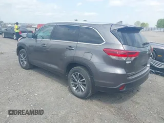 2019 Toyota Highlander SE with VIN 5TDKZRFH3KS353087, listed as a IAAI auction lot 42006593 with 74,214 mi miles and . Bid and sale history available at DreamBid. Image 3.