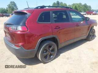 2019 Jeep Cherokee Latitude Plus with VIN 1C4PJLLBXKD339435, listed as a IAAI auction lot 42224535 with 104,276 mi miles and . Bid and sale history available at DreamBid. Image 4.