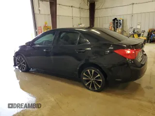 2019 Toyota Corolla L z VIN 5YFBURHE3KP906802, wystawiony jako Copart lot #41758285 z przebiegiem 136 313 mil mil oraz Czysty tytuł • Clean title. Historia ofert i sprzedaży dostępna na DreamBid. Obrazek 2.