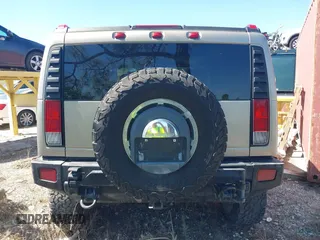 2005 Hummer H2 SUV with VIN 5GRGN23U85H129007, listed as a IAAI auction lot 41625417 with 102,389 mi miles. Bid and sale history available at carsss.com. Image 16.
