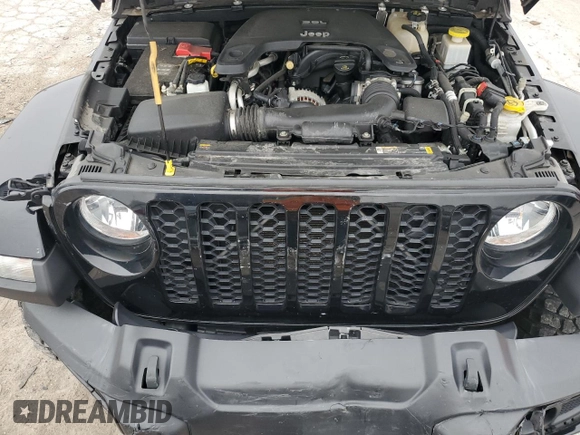 2021 Jeep Gladiator Willys z VIN 1C6HJTAG4ML600996, wystawiony jako Copart lot #59465435 z przebiegiem 62 574 mil mil oraz Szkoda całkowita • Salvage title. Historia ofert i sprzedaży dostępna na DreamBid. Obrazek 12.
