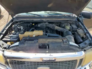 2000 Ford Excursion Limited z VIN 1FMNU42L0YED60100, wystawiony jako Copart lot #58760345 z przebiegiem 239 477 mil mil oraz Szkoda całkowita • Salvage title. Historia ofert i sprzedaży dostępna na DreamBid. Obrazek 12.