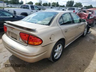 2002 Oldsmobile Alero GL1 with VIN 1G3NL52E62C181352, listed as a Copart auction lot 66348333 with 104,540 mi miles and Salvage Title. Bid and sale history available at DreamBid. Image 3.