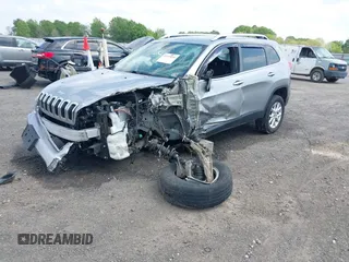 2016 Jeep Cherokee Latitude with VIN 1C4PJMCS2GW267423, listed as a IAAI auction lot 42018980 with 183,941 mi miles. Bid and sale history available at carsss.com. Image 18.