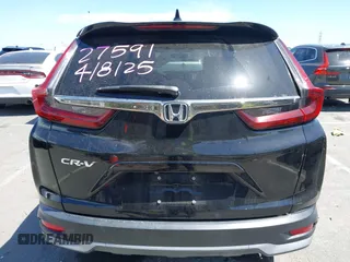2020 Honda CR-V EX z VIN 5J6RW1H59LA011759, wystawiony jako IAAI lot #42000159 z przebiegiem 79 019 mil mil oraz . Historia ofert i sprzedaży dostępna na DreamBid. Obrazek 16.