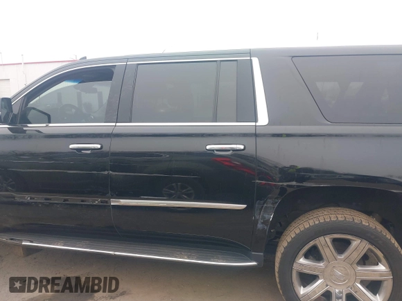 2019 Cadillac Escalade ESV Luxury z VIN 1GYS4HKJ0KR276995, wystawiony jako IAAI lot #41600945 z przebiegiem 87 701 mil mil oraz . Historia ofert i sprzedaży dostępna na DreamBid. Obrazek 14.