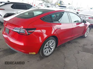 2022 Tesla Model 3 with VIN 5YJ3E1EA8NF177409, listed as a IAAI auction lot 41740718 with 25,557 mi miles. Bid and sale history available at carsss.com. Image 4.