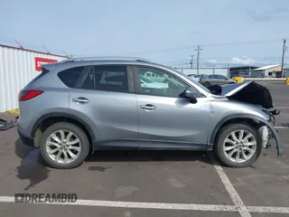 2014 Mazda CX-5 Grand Touring with VIN JM3KE4DY9E0375014, listed as a IAAI auction lot 42000382 with 110,584 mi miles and . Bid and sale history available at DreamBid. Image 14.