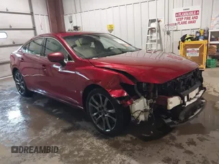 2017 Mazda 6 Grand Touring with VIN JM1GL1X57H1135401, listed as a IAAI auction lot 41722330 with 100,869 mi miles. Bid and sale history available at carsss.com. Image 1.