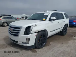 2016 Cadillac Escalade Luxury Collection with VIN 1GYS4BKJ2GR156944, listed as a IAAI auction lot 41644192 with 135,862 mi miles. Bid and sale history available at carsss.com. Image 2.