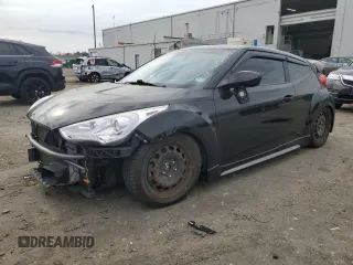 2013 Hyundai Veloster Turbo z VIN KMHTC6AE7DU152689, wystawiony jako Copart lot #51569125 z przebiegiem 102 152 mil mil oraz Szkody całkowita. Historia ofert i sprzedaży dostępna na DreamBid. Obrazek 1.