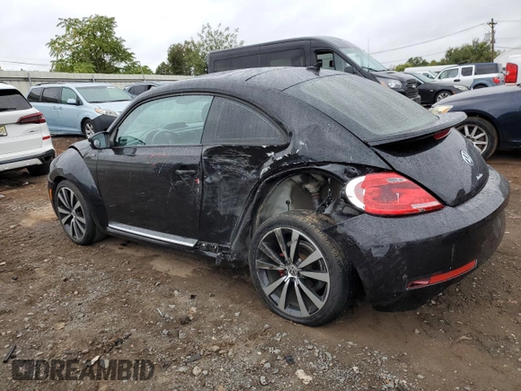2014 Volkswagen Beetle Turbo R-Line with VIN 3VWVT7AT2EM603435, listed as a Copart auction lot 72755524 with 99,300 mi miles and Salvage Title. Bid and sale history available at DreamBid. Image 2.