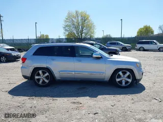 2011 Jeep Grand Cherokee Overland with VIN 1J4RR6GT6BC568491, listed as a IAAI auction lot 42035464 with 147,389 mi miles. Bid and sale history available at carsss.com. Image 13.