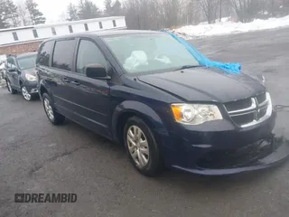 2016 Dodge Grand Caravan SE with VIN 2C4RDGBG3GR258639, listed as a IAAI auction lot 41687082 with 99,616 mi miles and . Bid and sale history available at DreamBid. Image 1.