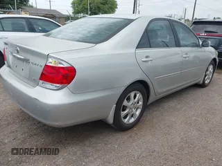 2006 Toyota Camry LE z VIN 4T1BF32K86U119208, wystawiony jako IAAI lot #42127284 z przebiegiem 99 864 mil mil oraz . Historia ofert i sprzedaży dostępna na DreamBid. Obrazek 4.