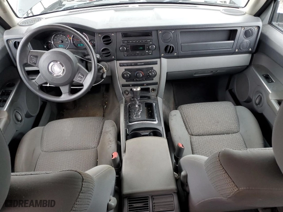 2006 Jeep Commander with VIN 1J8HG48K36C356793, listed as a Copart auction lot 52071605 with 218,100 mi miles and Salvage Title. Bid and sale history available at carsss.com. Image 8.