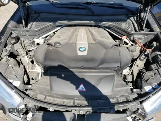 2016 BMW X5 xDrive50i with VIN 5UXKR6C59G0J81052, listed as a Copart auction lot 49572985 with 90,207 mi miles and Salvage Title. Bid and sale history available at carsss.com. Image 12.