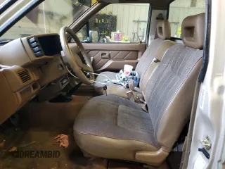 1992 Isuzu Pickup S z VIN 4S1CL11L0N4208813, wystawiony jako Copart lot #80966344 z przebiegiem 166 056 mil mil oraz Szkody całkowita. Historia ofert i sprzedaży dostępna na DreamBid. Obrazek 7.