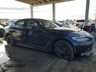 2024 BMW i4 eDrive35 with VIN WBY43AW05RFR93803, listed as a Copart auction lot 87611145 with 0 mi miles and Non Repairable. Bid and sale history available at carsss.com. Image 4.
