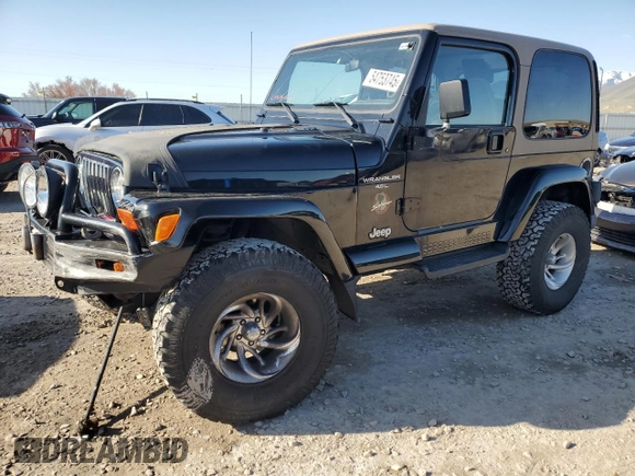 1999 Jeep Wrangler Sahara with VIN 1J4FY49S9XP479545, listed as a Copart auction lot 54753745 with 34,642 mi miles and Salvage title. Bid and sale history available at DreamBid. Image 1.