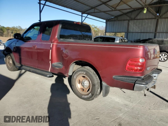 2003 Ford F-150 XL with VIN 1FTRX07L33KB73992, listed as a Copart auction lot 79565774 with 160,545 mi miles and Salvage title. Bid and sale history available at DreamBid. Image 2.