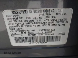 2015 Infiniti Q50 Premium with VIN JN1BV7AP8FM331055, listed as a IAAI auction lot 41828967 with 110,683 mi miles. Bid and sale history available at carsss.com. Image 9.