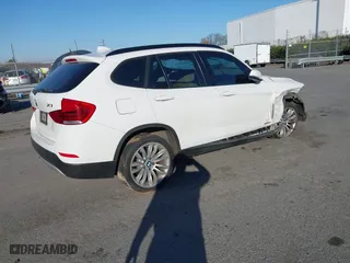 2015 BMW X1 xDrive28i with VIN WBAVL1C50FVY26009, listed as a IAAI auction lot 41495667 with 109,807 mi miles. Bid and sale history available at carsss.com. Image 4.