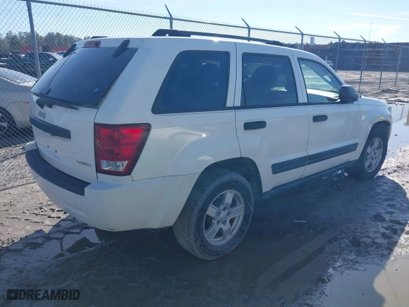 2005 Jeep Grand Cherokee Laredo with VIN 1J4GS48N75C505209, listed as a IAAI auction lot 41452637 with 263,653 mi miles. Bid and sale history available at carsss.com. Image 4.