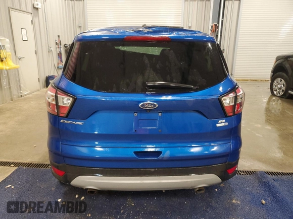 2017 Ford Escape SE with VIN 1FMCU9GD1HUB78854, listed as a Copart auction lot 51444205 with 97,399 mi miles and Salvage Title. Bid and sale history available at carsss.com. Image 6.