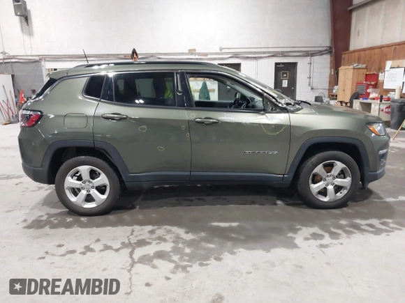 2021 Jeep Compass Latitude with VIN 3C4NJDBB1MT566220, listed as a IAAI auction lot 41816107 with 69,139 mi miles and . Bid and sale history available at DreamBid. Image 13.