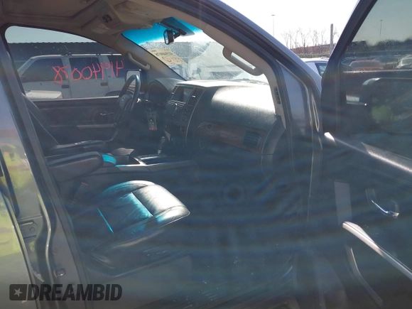 2015 Nissan Armada SV with VIN 5N1BA0ND6FN604077, listed as a IAAI auction lot 41940078 with 169,266 mi miles and . Bid and sale history available at DreamBid. Image 5.